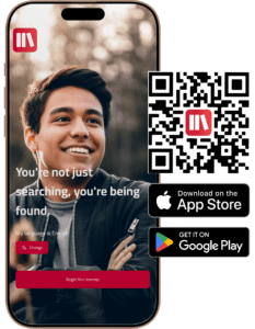 A smartphone displaying a smiling young man with the text 
